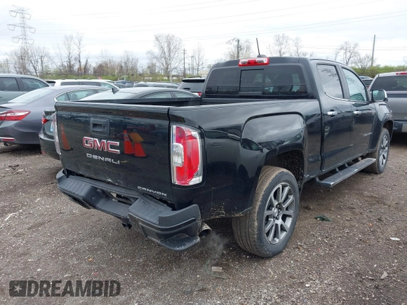 2021 GMC Canyon 4WD Denali with VIN 1GTG6EEN6M1260580, listed as a IAAI auction lot 41918693 with 52,085 mi miles. Bid and sale history available at carsss.com. Image 4.