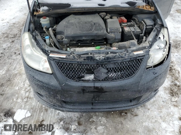 2011 Suzuki SX4 with VIN JS2YC5A44B6300171, listed as a Copart auction lot 87673685 with 116,483 mi miles and Salvage Title. Bid and sale history available at DreamBid. Image 11.