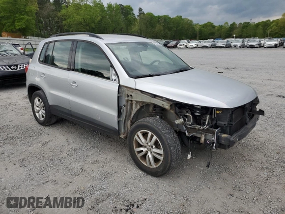 2017 Volkswagen Tiguan S with VIN WVGAV7AX9HK002092, listed as a Copart auction lot 52210695 with 113,791 mi miles and Salvage Title. Bid and sale history available at DreamBid. Image 4.