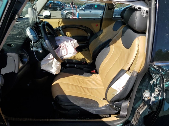2004 MINI Hardtop with VIN WMWRC33484TJ58571, listed as a Copart auction lot 74843094 with Not Provided miles and Salvage Title. Bid and sale history available at DreamBid. Image 7.