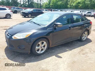2014 Ford Focus SE with VIN 1FADP3F24EL431332, listed as a IAAI auction lot 42135538 with 121,362 mi miles. Bid and sale history available at carsss.com. Image 2.