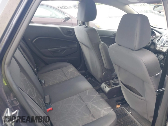 2013 Ford Fiesta SE z VIN 3FADP4BJ3DM142247, wystawiony jako IAAI lot #42337359 z przebiegiem 149 711 mil mil oraz . Historia ofert i sprzedaży dostępna na DreamBid. Obrazek 8.