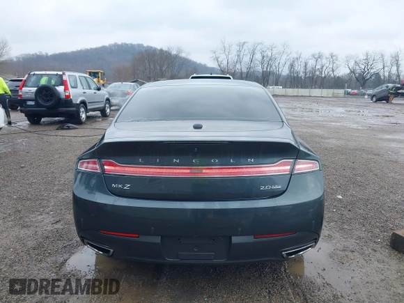 2015 Lincoln MKZ z VIN 3LN6L2J90FR616800, wystawiony jako IAAI lot #41683401 z przebiegiem 92 239 mil mil oraz . Historia ofert i sprzedaży dostępna na DreamBid. Obrazek 16.