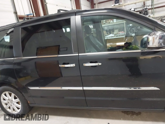 2012 Chrysler Town & Country Touring L with VIN 2C4RC1CGXCR170910, listed as a IAAI auction lot 41911179 with 167,850 mi miles and . Bid and sale history available at carsss.com. Image 13.