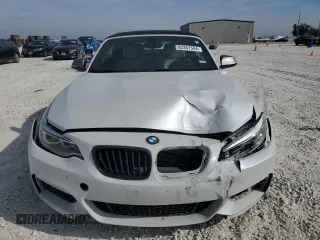 2016 BMW 2 Series M235i with VIN WBA1M1C52GV394052, listed as a Copart auction lot 82261594 with 83,979 mi miles and Salvage Title. Bid and sale history available at carsss.com. Image 5.