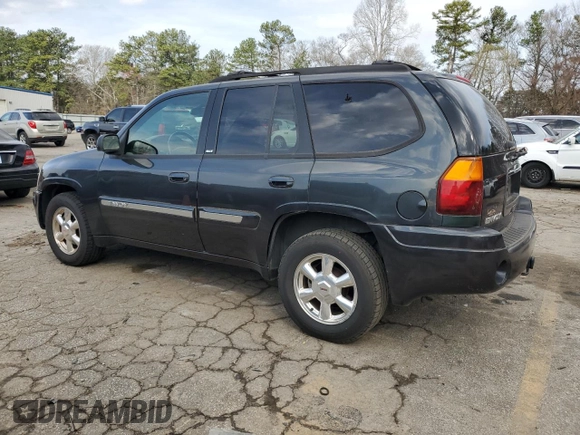 2003 GMC Envoy SLT z VIN 1GKDS13S332326838, wystawiony jako Copart lot #48888545 z przebiegiem 197 969 mil mil oraz Czysty tytuł • Clean title. Historia ofert i sprzedaży dostępna na DreamBid. Obrazek 2.