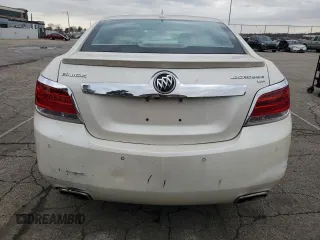 2013 Buick LaCrosse Premium 1 с VIN 1G4GG5E37DF213570, выставлен на аукционе Copart как лот 82154134 с пробегом 152 478 миль миль и Списание • Salvage title. История ставок и продаж доступна на DreamBid. Изображение 6.