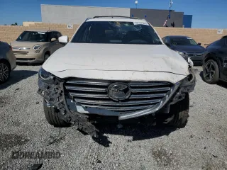 2019 Mazda CX-9 Grand Touring with VIN JM3TCBDY4K0303079, listed as a Copart auction lot 52557565 with 72,946 mi miles and Salvage Title. Bid and sale history available at DreamBid. Image 5.