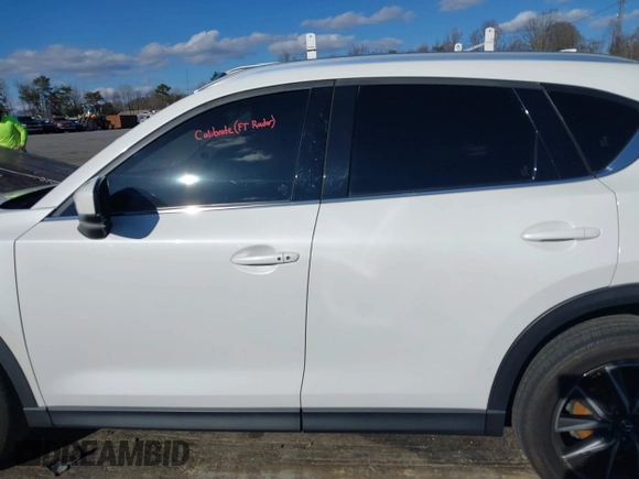 2018 Mazda CX-5 Grand Touring with VIN JM3KFBDM6J0435579, listed as a IAAI auction lot 41208899 with 131,212 mi miles. Bid and sale history available at carsss.com. Image 15.