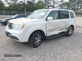 2014 Honda Pilot Touring with VIN 5FNYF4H93EB023602, listed as a IAAI auction lot 41909653 with 162,118 mi miles and . Bid and sale history available at carsss.com. Image 17.