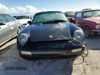 1995 Porsche 911 Carrera with VIN WP0AA2990SS323244, listed as a Copart auction lot 77215074 with 0 mi miles and Non Repairable. Bid and sale history available at carsss.com. Image 5.