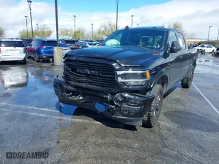 2022 Ram 2500 Laramie with VIN 3C6UR5FL2NG377414, listed as a IAAI auction lot 41492443 with 100,477 mi miles. Bid and sale history available at carsss.com. Image 2.