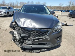 2014 Mazda CX-5 Grand Touring with VIN JM3KE4DY4E0422739, listed as a Copart auction lot 53234745 with 54,152 mi miles and Salvage Title. Bid and sale history available at carsss.com. Image 5.