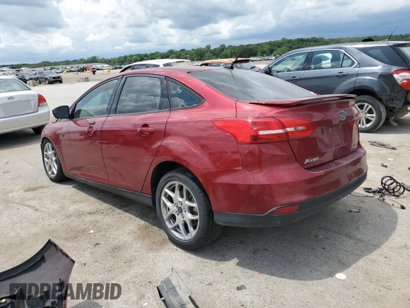 2015 Ford Focus SE with VIN 1FADP3F22FL368703, listed as a Copart auction lot 61609235 with 147,269 mi miles and Salvage title. Bid and sale history available at DreamBid. Image 2.