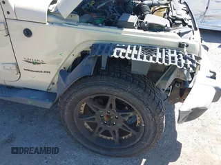 2011 Jeep Wrangler Sahara with VIN 1J4AA5D13BL562732, listed as a IAAI auction lot 41838520 with 148,359 mi miles and . Bid and sale history available at DreamBid. Image 6.