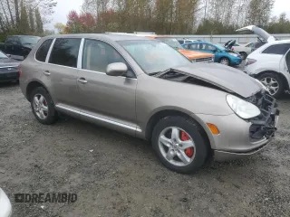 2005 Porsche Cayenne Turbo with VIN WP1AC29P75LA90100, listed as a Copart auction lot 74377104 with 209,034 mi miles and Salvage Title. Bid and sale history available at carsss.com. Image 4.