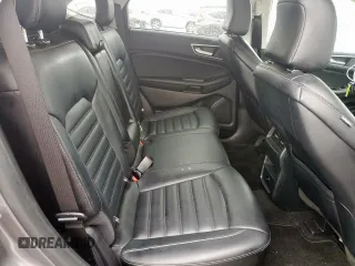 2024 Ford Edge SEL z VIN 2FMPK4J97RBA98092, wystawiony jako Copart lot #52000715 z przebiegiem 23 845 mil mil oraz Szkoda całkowita • Salvage title. Historia ofert i sprzedaży dostępna na DreamBid. Obrazek 11.