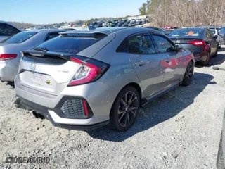 2018 Honda Civic Hatchback Sport with VIN SHHFK7H42JU224960, listed as a IAAI auction lot 41590645 with 121,319 mi miles. Bid and sale history available at carsss.com. Image 4.