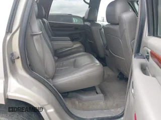 2004 Cadillac Escalade z VIN 1GYEK63N14R177291, wystawiony jako IAAI lot #42263535 z przebiegiem 170 550 mil mil oraz . Historia ofert i sprzedaży dostępna na DreamBid. Obrazek 8.