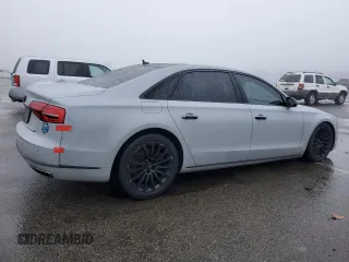 2016 Audi A8 3.0T z VIN WAU34AFD5GN014679, wystawiony jako Copart lot #86691744 z przebiegiem 119 422 mil mil oraz Szkoda całkowita • Salvage title. Historia ofert i sprzedaży dostępna na DreamBid. Obrazek 3.