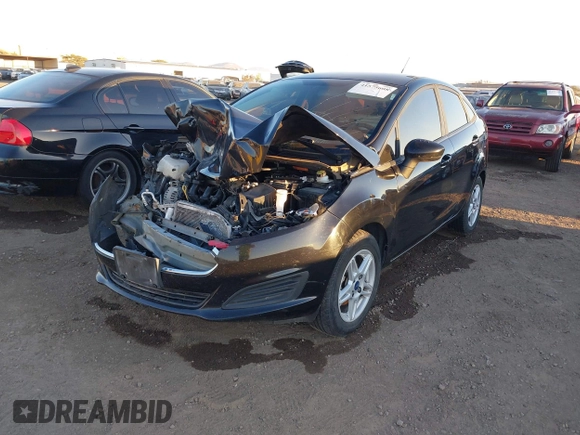 2018 Ford Fiesta SE with VIN 3FADP4BJ0JM121836, listed as a IAAI auction lot 41575608 with 74,010 mi miles. Bid and sale history available at carsss.com. Image 2.