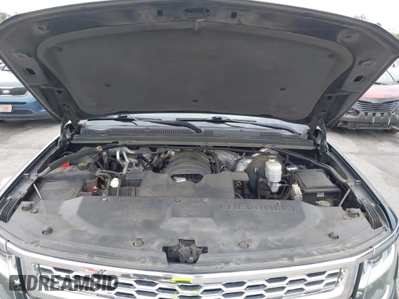 2015 Chevrolet Tahoe LT with VIN 1GNSCBKC4FR145119, listed as a IAAI auction lot 42309931 with 99,408 mi miles and . Bid and sale history available at DreamBid. Image 10.