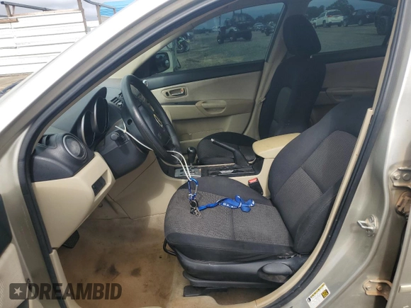 2008 Mazda 3 i Sport with VIN JM1BK12F181790912, listed as a Copart auction lot 79189674 with 289,265 mi miles and Salvage Title. Bid and sale history available at DreamBid. Image 7.