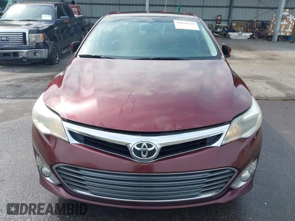 2014 Toyota Avalon Limited with VIN 4T1BK1EB3EU113035, listed as a IAAI auction lot 42040239 with 118,609 mi miles. Bid and sale history available at carsss.com. Image 6.