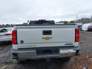 2014 Chevrolet Silverado 1500 Work Truck with VIN 1GCVKPEH9EZ305099, listed as a IAAI auction lot 41740048 with 212,886 mi miles and . Bid and sale history available at DreamBid. Image 17.