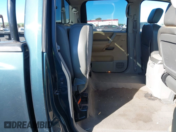 2004 Nissan Titan LE with VIN 1N6AA07A74N568235, listed as a IAAI auction lot 41713080 with 187,318 mi miles and . Bid and sale history available at DreamBid. Image 8.