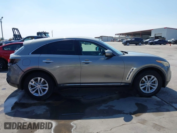2011 Infiniti FX with VIN JN8AS1MW7BM731267, listed as a IAAI auction lot 41780959 with 236,675 mi miles and . Bid and sale history available at DreamBid. Image 14.