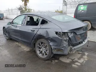 2018 Tesla Model 3 Long Range Battery with VIN 5YJ3E1EB7JF114305, listed as a IAAI auction lot 41765994 with 76,945 mi miles and . Bid and sale history available at DreamBid. Image 3.