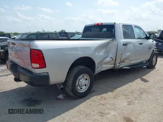 2018 Ram 2500 Tradesman with VIN 3C6UR4HL3JG325551, listed as a IAAI auction lot 42171102 with 306,153 mi miles and . Bid and sale history available at DreamBid. Image 4.