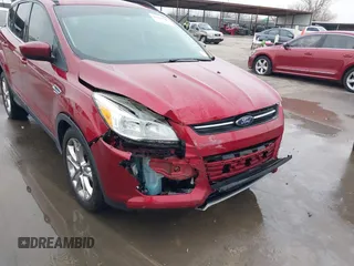 2015 Ford Escape SE with VIN 1FMCU0GXXFUC74470, listed as a IAAI auction lot 41419669 with 94,107 mi miles. Bid and sale history available at carsss.com. Image 6.