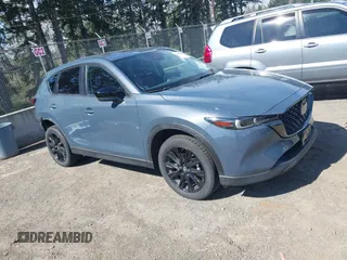 2023 Mazda CX-5 2.5 S Carbon Edition with VIN JM3KFBCM8P0134757, listed as a IAAI auction lot 41893648 with 9,587 mi miles. Bid and sale history available at carsss.com. Image 1.