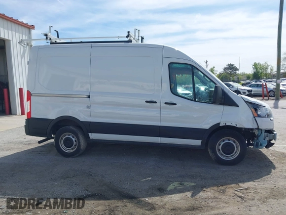 2023 Ford Transit Cargo z VIN 1FTYE1CG2PKB14938, wystawiony jako IAAI lot #41964017 z przebiegiem 6 902 mil mil oraz . Historia ofert i sprzedaży dostępna na DreamBid. Obrazek 13.