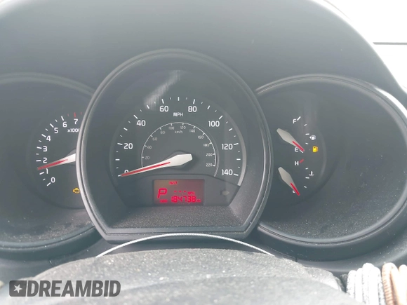 2015 Kia Rio LX with VIN KNADM4A33F6427021, listed as a IAAI auction lot 42011458 with 184,738 mi miles. Bid and sale history available at carsss.com. Image 7.