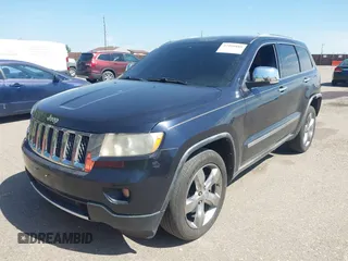 2011 Jeep Grand Cherokee Overland with VIN 1J4RS6GG9BC613396, listed as a IAAI auction lot 42490889 with 150,601 mi miles and . Bid and sale history available at DreamBid. Image 2.