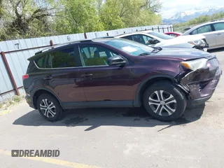2017 Toyota RAV4 LE with VIN 2T3BFREV4HW580568, listed as a IAAI auction lot 42100704 with 157,300 mi miles and . Bid and sale history available at DreamBid. Image 13.