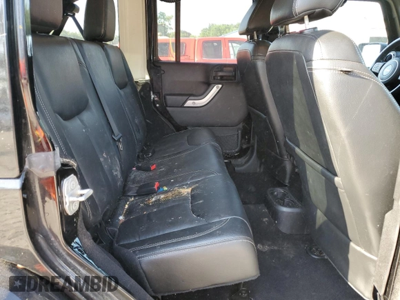 2015 Jeep Wrangler Unlimited Sahara with VIN 1C4HJWEGXFL744852, listed as a Copart auction lot 60246145 with 135,496 mi miles and Salvage title. Bid and sale history available at DreamBid. Image 11.