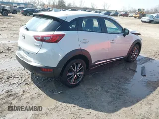 2016 Mazda CX-3 Grand Touring with VIN JM1DKFD76G0134205, listed as a IAAI auction lot 41661904 with 190,368 mi miles. Bid and sale history available at carsss.com. Image 4.