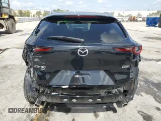 2023 Mazda CX-30 S Carbon Edition z VIN 3MVDMBCM2PM572015, wystawiony jako Copart lot #60109135 z przebiegiem 27 790 mil mil oraz Szkoda całkowita • Salvage title. Historia ofert i sprzedaży dostępna na DreamBid. Obrazek 6.