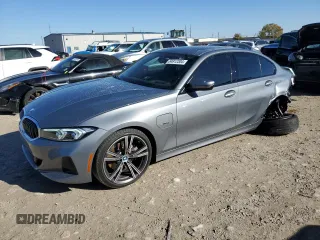2023 BMW 3 Series 330e xDrive with VIN 3MW39FS07P8D00974, listed as a Copart auction lot 84912304 with 18,879 mi miles and Salvage Title. Bid and sale history available at carsss.com. Image 1.
