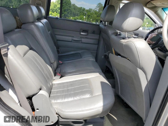 2004 Dodge Durango Limited with VIN 1D4HD58D94F154997, listed as a Copart auction lot 58973804 with 208,595 mi miles and Salvage title. Bid and sale history available at DreamBid. Image 12.