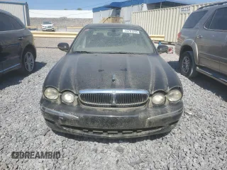 2002 Jaguar X-Type z VIN SAJEA51C02WC53526, wystawiony jako Copart lot #53761265 z przebiegiem 156 584 mil mil oraz Czysty tytuł • Clean title. Historia ofert i sprzedaży dostępna na DreamBid. Obrazek 5.