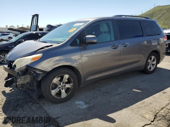2014 Toyota Sienna LE AAS with VIN 5TDKK3DC0ES512211, listed as a Copart auction lot 49673535 with 164,465 mi miles and Salvage title. Bid and sale history available at DreamBid. Image 1.