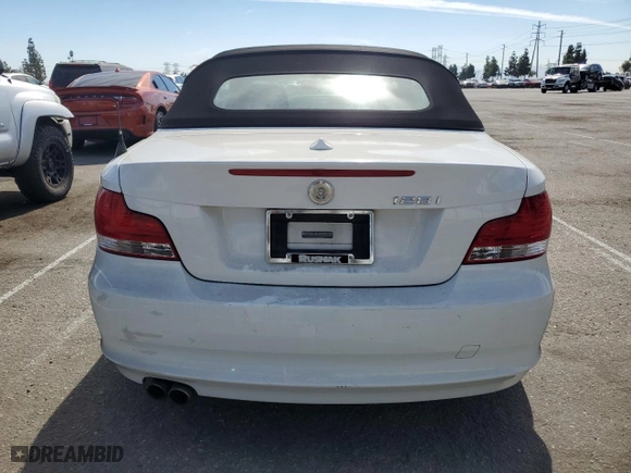 2010 BMW 1 Series 128i with VIN WBAUN1C51AVH81857, listed as a Copart auction lot 76075704 with 119,511 mi miles and Salvage Title. Bid and sale history available at carsss.com. Image 6.