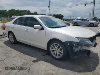 2012 Ford Fusion SEL z VIN 3FAHP0JAXCR241497, wystawiony jako Copart lot #58884165 z przebiegiem 100 813 mil mil oraz Szkoda całkowita • Salvage title. Historia ofert i sprzedaży dostępna na DreamBid. Obrazek 4.