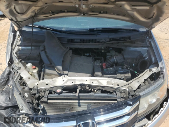 2014 Honda Odyssey EX-L z VIN 5FNRL5H66EB045019, wystawiony jako Copart lot #62899125 z przebiegiem 179 298 mil mil oraz Szkoda całkowita • Salvage title. Historia ofert i sprzedaży dostępna na DreamBid. Obrazek 12.
