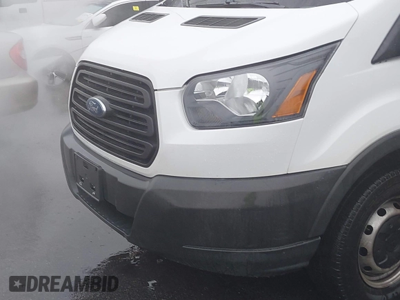 2018 Ford Transit with VIN 1FTBW2CMXJKA90555, listed as a IAAI auction lot 41539215 with 87,913 mi miles and . Bid and sale history available at DreamBid. Image 6.